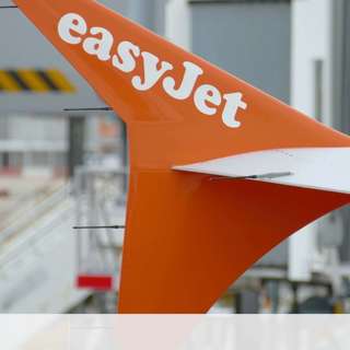 UK Police Arrest Six Amid Protests, UK Lottery Jackpot Hits £177 Million, easyJet Profits Soar 34 Percent, Hague Elected Oxford Chancellor, and more...