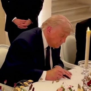 Trump signs agreement to end war with Iran