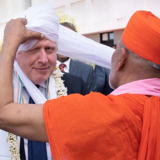 What's behind Boris's trip to India?
