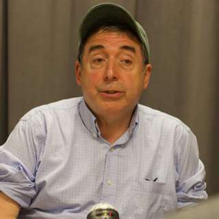 #87 – Russ Roberts on whether it's more effective to help strangers, or people you know