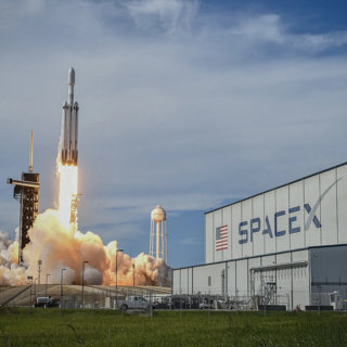 SpaceX Rockets To Record, UK PM Gets Defensive, Trump's Iran Deal Claims