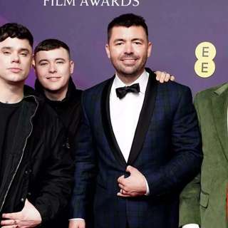 Elton John Praises Belfast Trio, King Charles Visits HMS Prince of Wales, UK Classifies Iran as Threat, UK Prepares for VE Day Celebrations, and more...