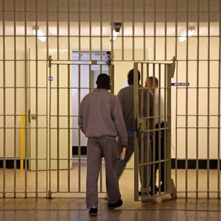 Burnham buckles on early prisoner release