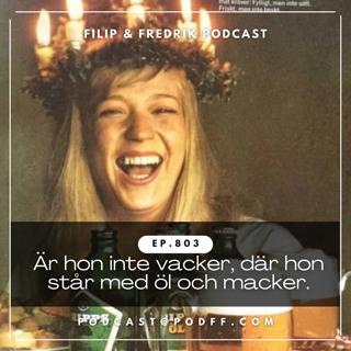 803. Är hon inte vacker, där hon står med öl och macker.