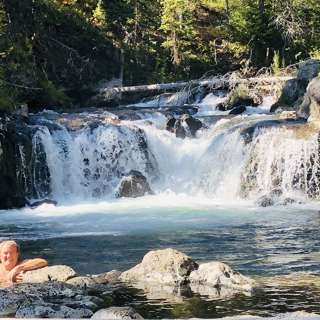 We cover 19 places in Yellowstone where you can Hot Pot, Swim and even get under a Huge Waterfall with warm water pouring all over you and do all of these any time the park is open.  
