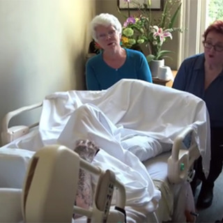 The Threshold Choir Singing Gently By The Bedside