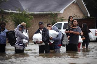 News Brief: Harvey, Climate Change and Snitch Reporters