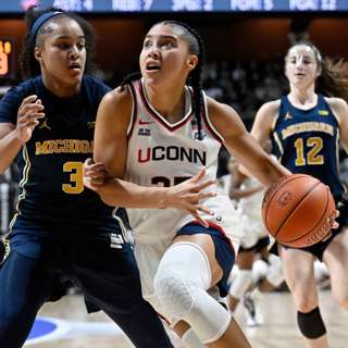 UConn Edges Michigan in Hall of Fame Showdown, California Sees Eco Boom, Villanova Domination Extends Streak, UC Nurses Win 18.5 Pay Hike, and more...