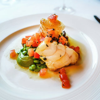 Why Do Rich People Love Lobster, Squash, and Monograms?