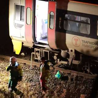 Fatal Train Crash in Wales, Glasgow Hosts Scaled-Down Commonwealth Games, HSBC Restructures Operations, UK Faces Massive Budget Shortfall, and more...