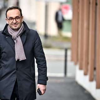 German Court Dismisses Climate Suit, Poste Italiane Buys Telecom Italia, Cazenave Wins Bordeaux Mayor, Vienna Insurance Posts Record Profit, and more...